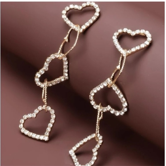 Jewelry - 💥2/$24 or 3/$30💥 Sparkling  gold & rhinestone interlocking heart earrings. NWT.